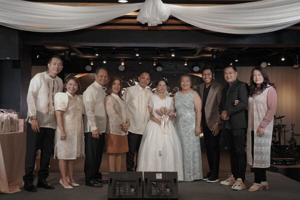 Reception celebration with couples and guests enjoying the event